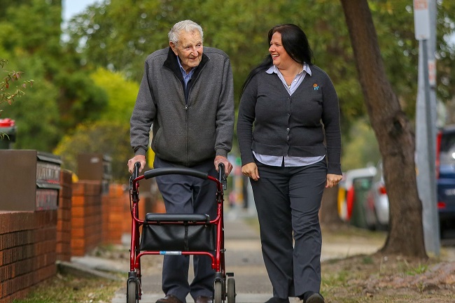 Home Care employee Tracey Kelly and customer Stan Neale out and about.